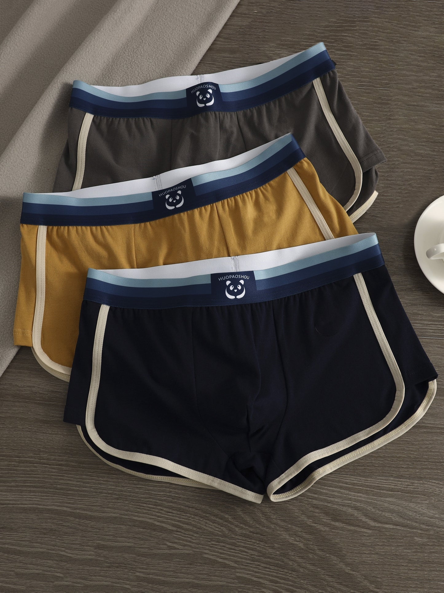 3 men's cotton boxer briefs for a comfortable fit with solid color, breathable, and stretchy material.