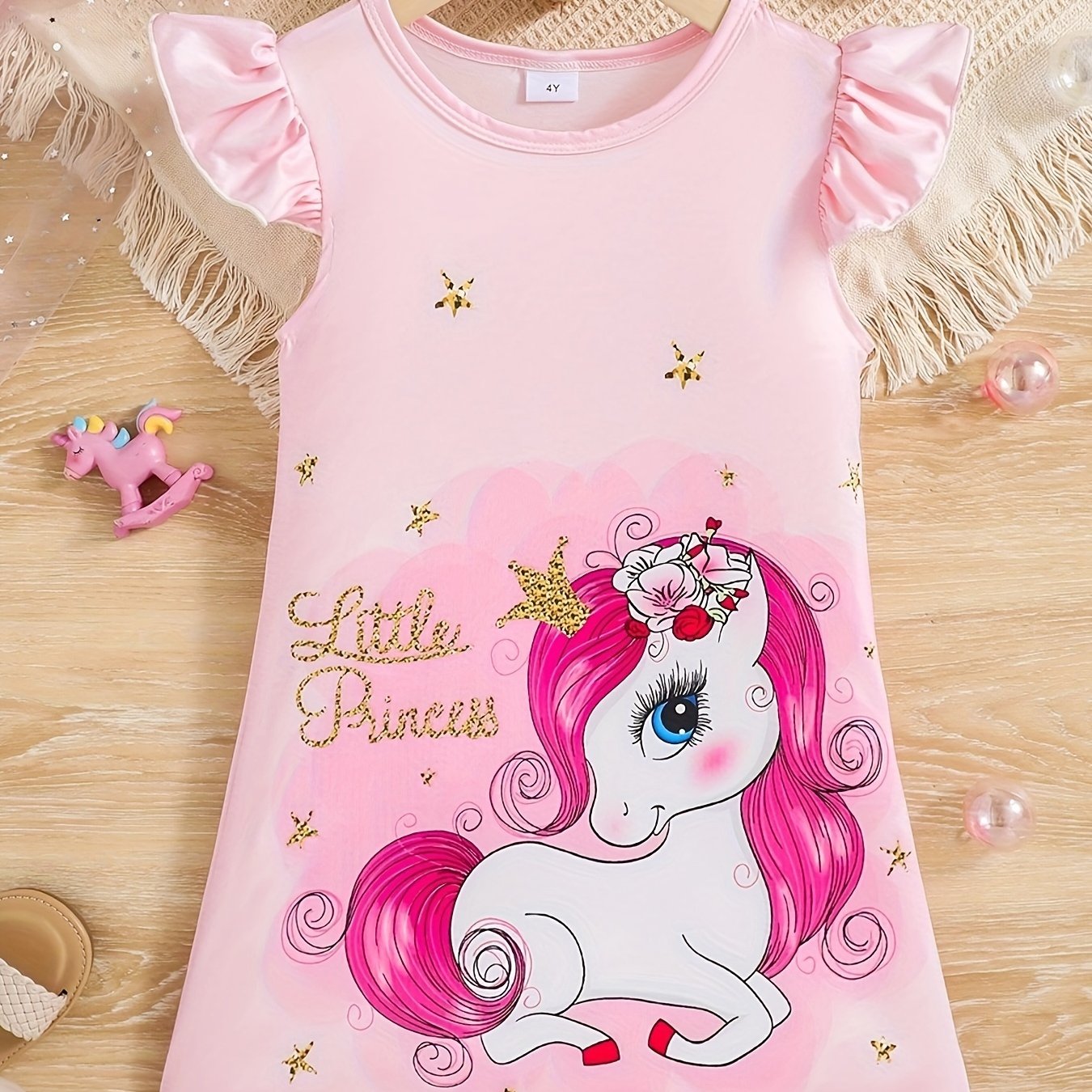 Girls' cute unicorn dress with flutter trim, perfect for spring and summer outings