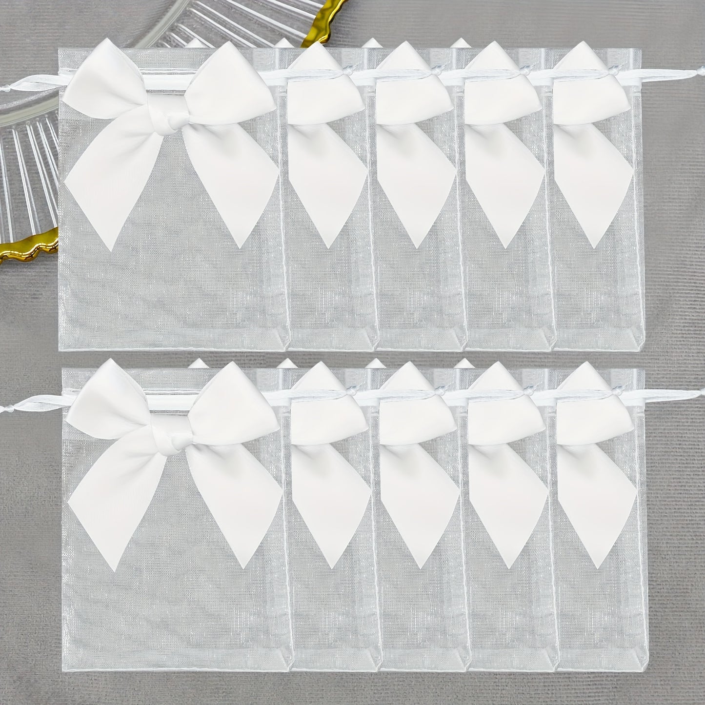 10 elegant organza bags with ribbon and bow, ideal for gift wrapping and party favors.