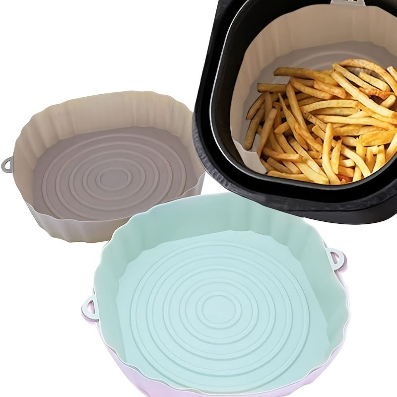 Two silicone air fryer liners, non-stick and reusable bakeware that is easy to clean and durable kitchen accessories designed to line your air fryer.