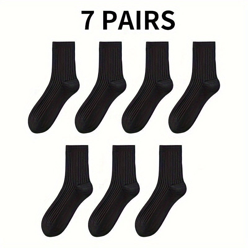 7 pairs of black and white thick mid-length socks for comfortable and breathable wear in autumn and winter.