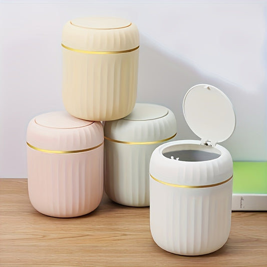 Press-top mini trash can made of durable PP material, ideal for office, bedroom, or living room. Equipped with lid for convenient waste disposal at home.