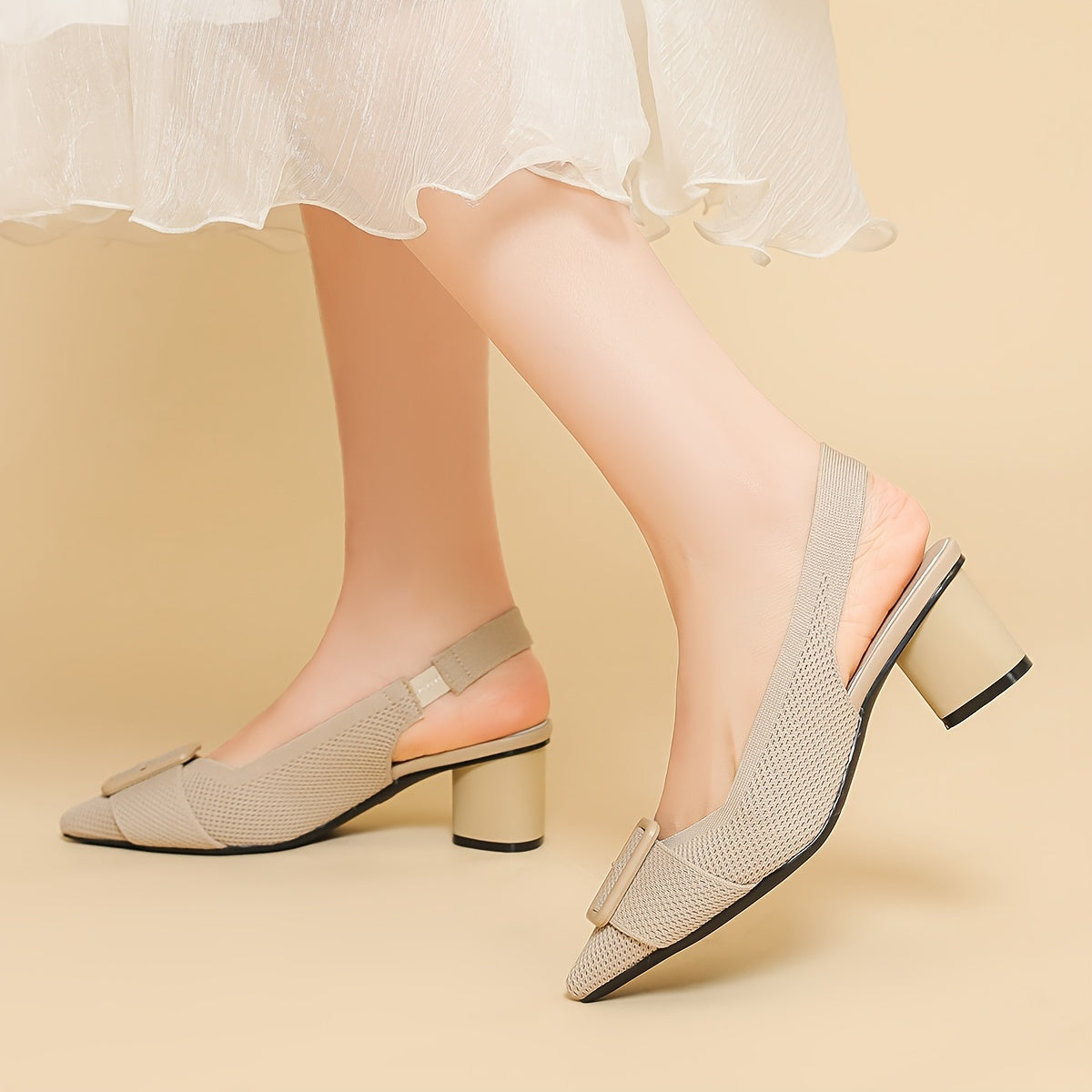 Women's mid-heel pumps with breathable knit, pointed toe, slip-on style, and chunky heel for all seasons.