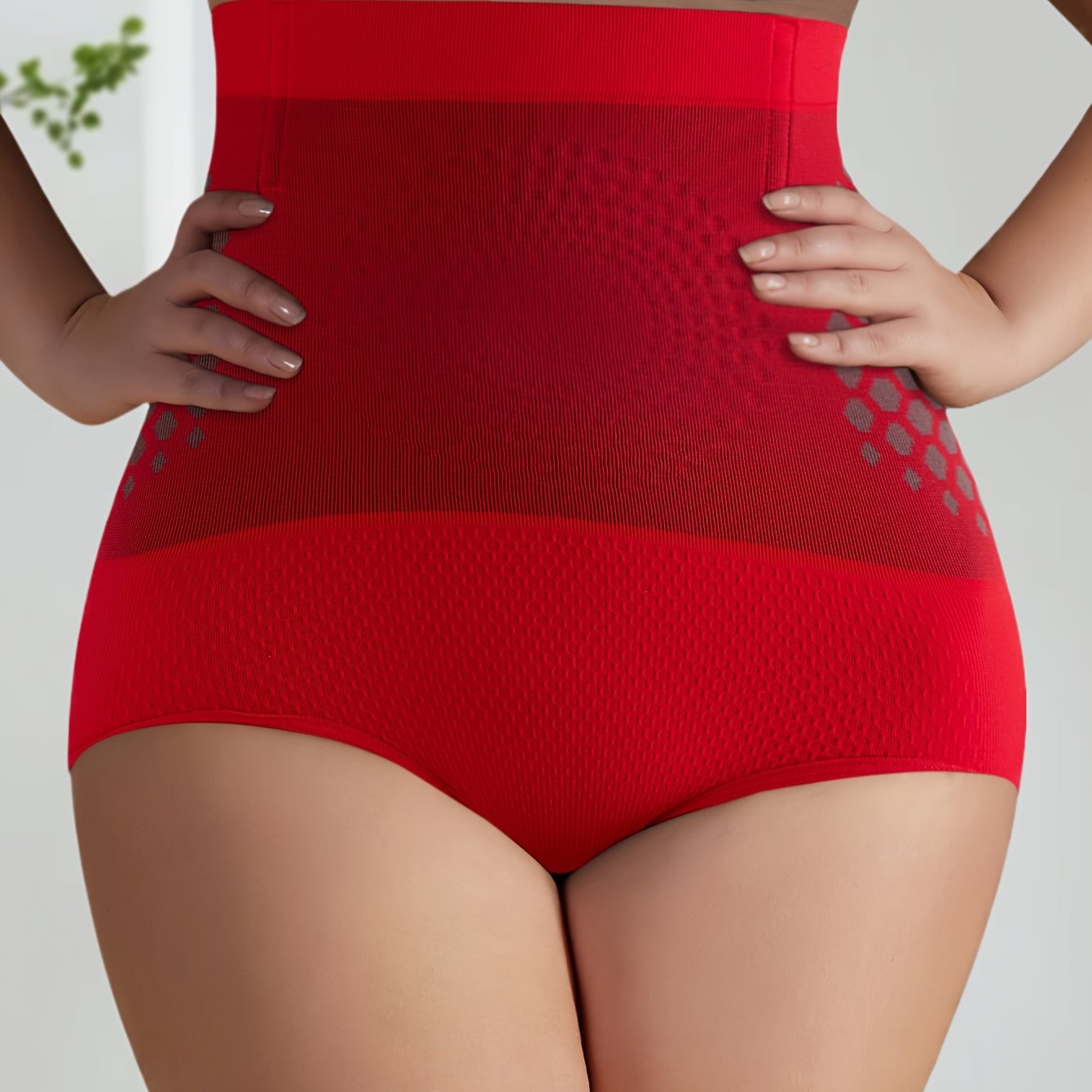 Plus size red shapewear panties for women, high waist, tummy control, made of breathable nylon-spandex blend, solid color, hand washable.