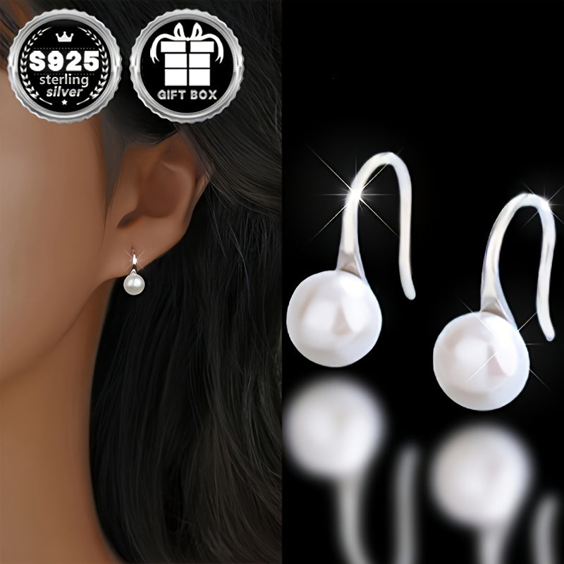 Classy and chic earrings designed for women, showcasing a timeless and minimalist style accented with lovely pearl details. Crafted from 1.55g of high-quality 925 silver, these earrings are perfect for everyday wear, work, special events, and make a