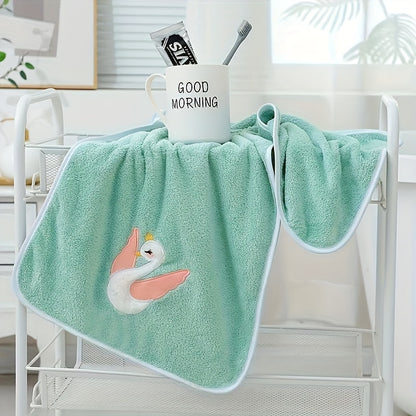 A 75*35cm Cartoon Swan Kid's Bath Towel with premium softness, absorbency, and quick-drying capability, ideal for use in the bathroom or at home.