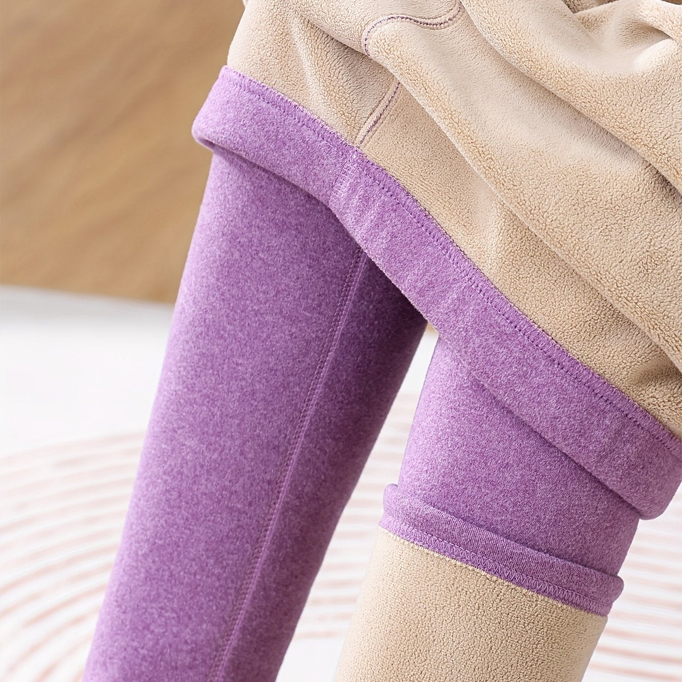 High waist fleece-lined leggings in pink and beige for autumn/winter, providing warmth and tummy control with a butt lift effect for workouts.