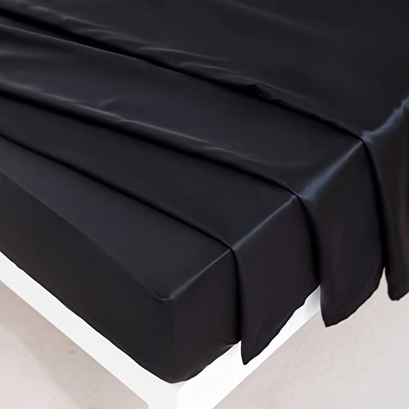 4 pieces of polyester satin solid fitted sheet set includes 1 fitted sheet, 1 flat sheet, and 2 pillowcases, available in Twin, Full, Queen, or King sizes.