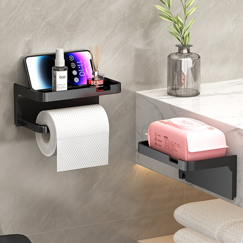 Wall-mounted bathroom toilet paper holder with shelves in matte black finish, includes phone stand, no-drill installation.