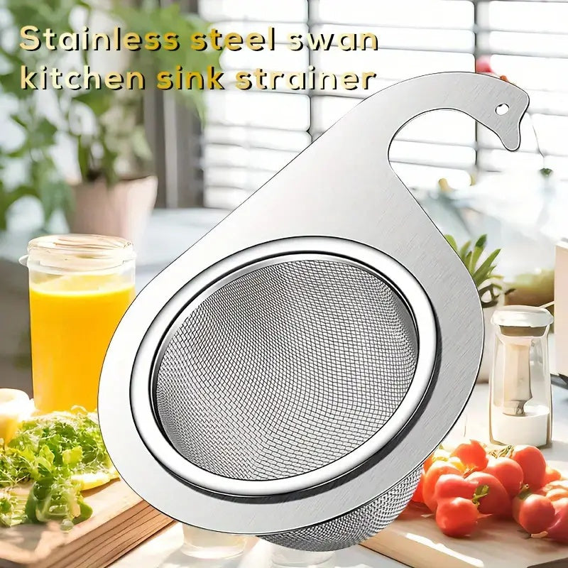 Introducing the elegant 1-piece Stainless Steel Swan-Shaped Draining Basket, a versatile Hanging Rack perfect for kitchen sinks. This innovative design requires no drilling and effectively separates wet and dry items. Ideal for kitchen use.