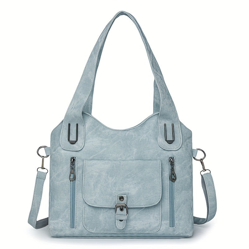 Retro women's shoulder tote bag with soft synthetic leather, adjustable strap, zipper closure, multiple pockets, and polyester lining in light blue/blue/black. Suitable for daily use or