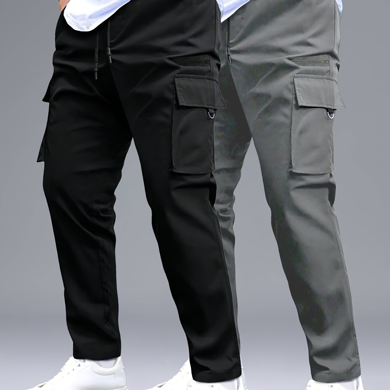 2 men's cargo pants in black and gray with drawstring waist, multiple pockets, made of durable polyester. Perfect for outdoor activities and casual wear.