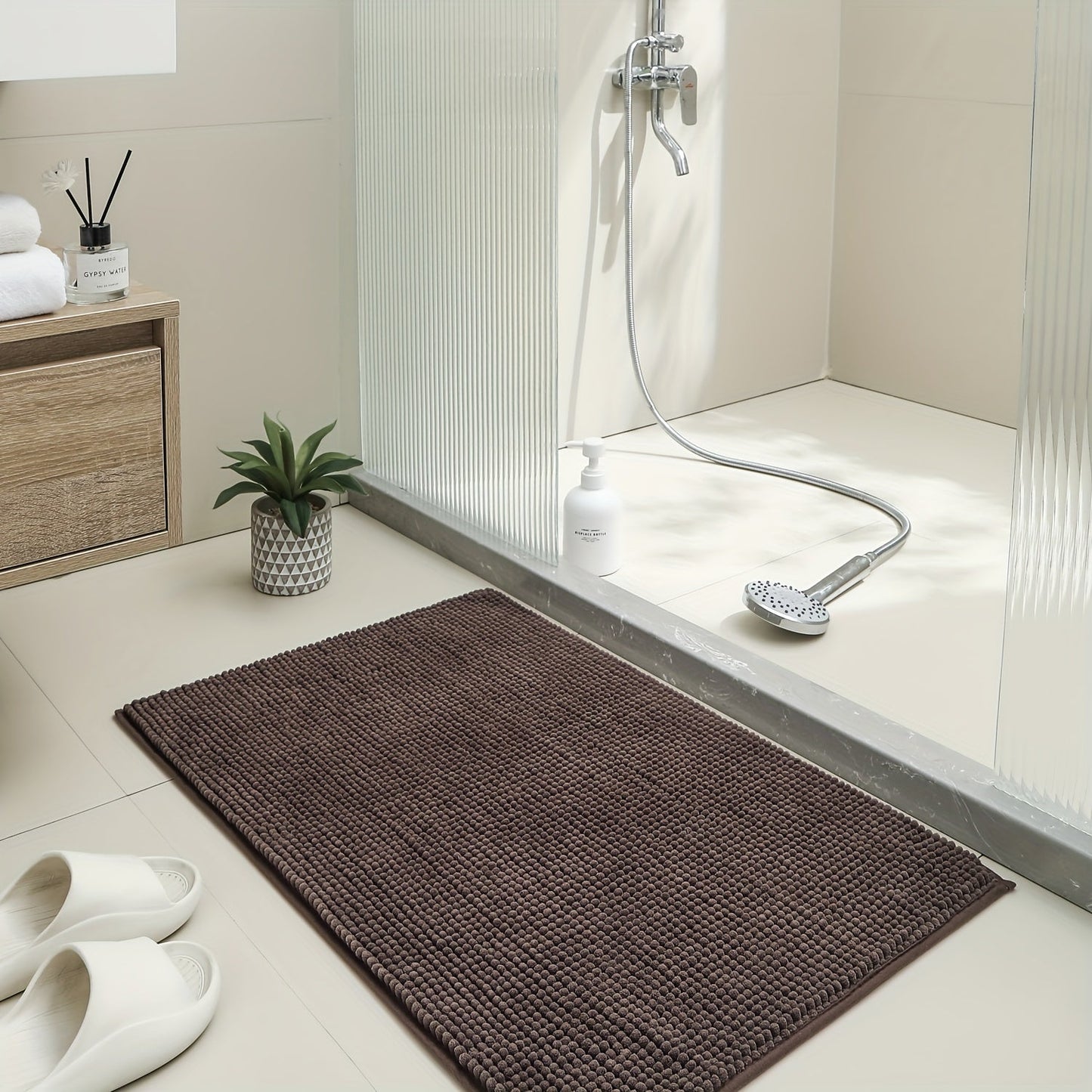 Get this luxurious Chenille Bath Mat, 2cm Thick, with a non-slip, super absorbent, quick-dry design. Made of woven polyester with rubber backing, this mat weighs 1450gsm and is perfect for the bathroom, kitchen, bedroom, or entryway. It also makes a