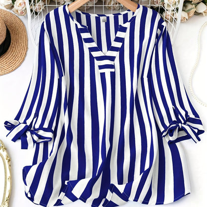 Elegant plus size striped print blouse with notched neck tie cuff for spring.