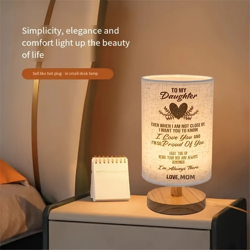 Modern solid wood table lamp with creative LED light, ideal for bedroom, study room, and guest house decor. Features natural wooden base.