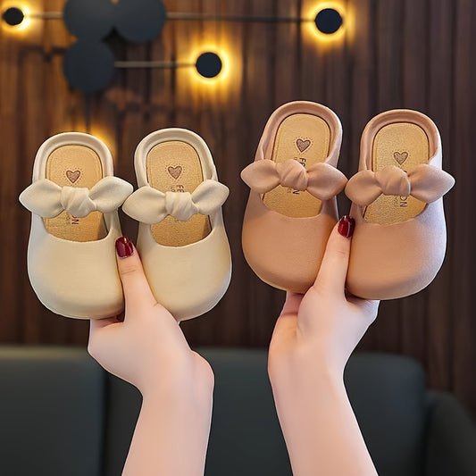 Stylish bowknot slip-on sandals for girls, perfect for indoor and outdoor wear.