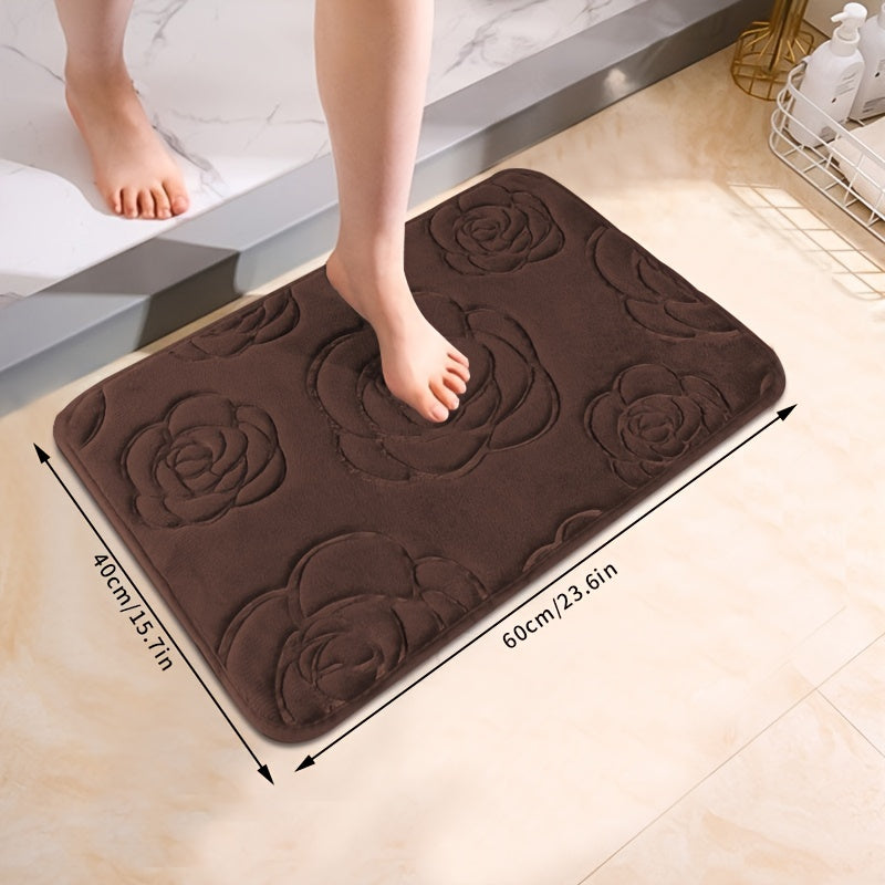 Soft and luxurious bath mat featuring a beautiful rose embossed design. This non-slip bathroom rug is made of ultra-soft knit polyester, providing superior comfort and absorbency. Lightweight and washable, this versatile mat is perfect for use in the