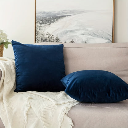 Luxurious dark blue chenille throw pillow cover with contemporary style and stain-resistant features. Made of 100% polyester with a zippered closure. Hand wash only for cozy living room decor.