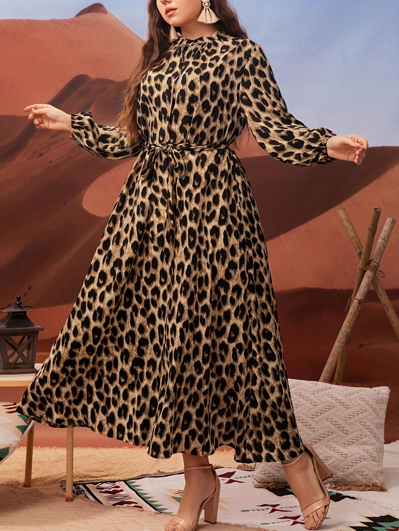 Plus-size leopard print dress with lantern sleeves, belt, collared neckline, and non-stretch polyester material. Machine washable and suitable for all seasons and occasions.