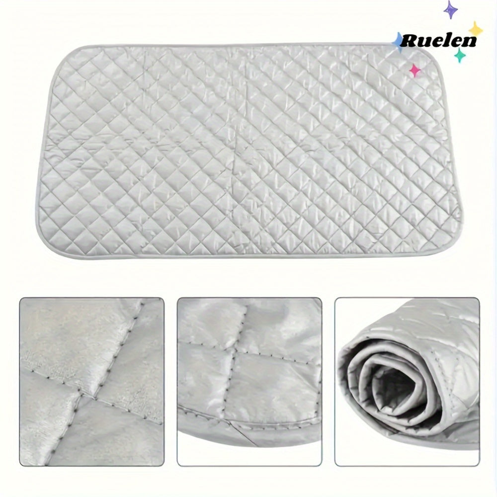 A portable ironing pad with a silver-plated exterior and a thick cotton interior. This heat-resistant, non-electric countertop pad is perfect for travel, hotel stays, or dorm rooms. It can also be used as a multifunctional laundry mat for dryers, washing