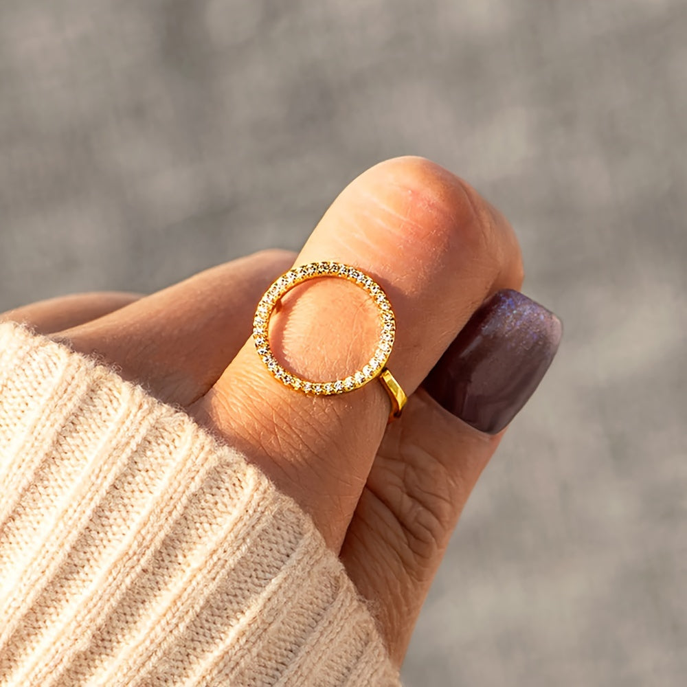 High quality jewelry featuring a sparkling circle design paved with shining zirconia stones, this 925 sterling silver ring is plated with 14k gold. Choose from golden, silvery, or rose golden tones to suit your preference.