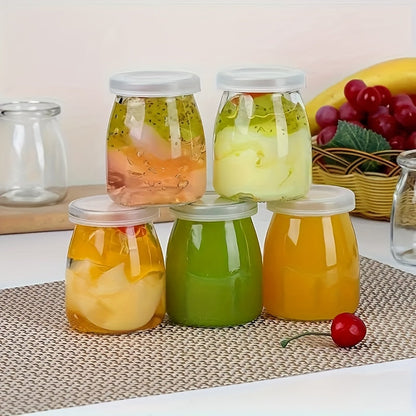 A set of 10 glass Mason jars with flip-top lids, perfect for storing yogurt, pudding, jam, mousse, honey, and more in the kitchen. Each jar holds 4oz and is reusable. These round glass containers are freezer and dishwasher safe, ideal for organizing and