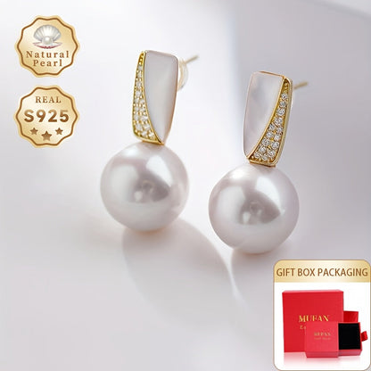 Surprise someone special with this must-have gift box containing a pair of fashionable dangling earrings for women. Made with S925 silver and featuring lustrous 11-12mm round natural freshwater pearls, each pair is unique as the natural pearls come in