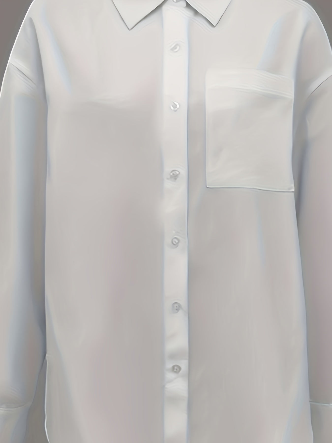 Stylish women's white shirt with pocket, long sleeves, and button-up collar made of non-stretch polyester. Machine washable.