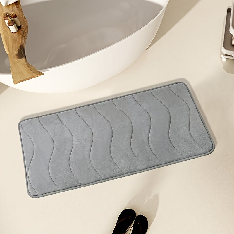 Soft and comfortable bath mat with high absorbency - ideal for bathrooms, showers, and bathtubs. Rectangular in shape, waterproof, and easy to clean.