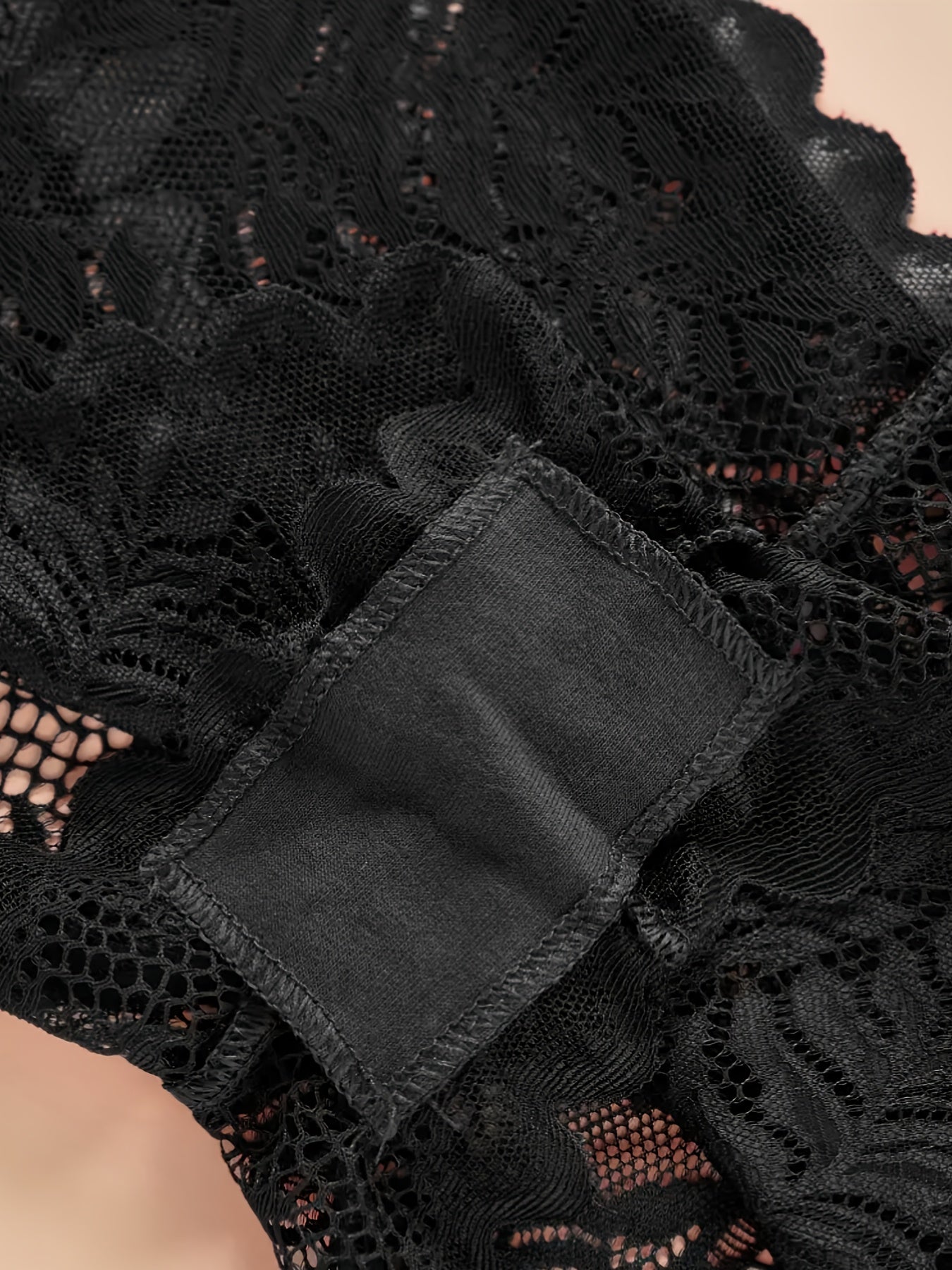 Sexy and comfortable lace boy shorts for women with floral pattern, low-rise, and breathable design. Nylon/elastane blend, hand washable.