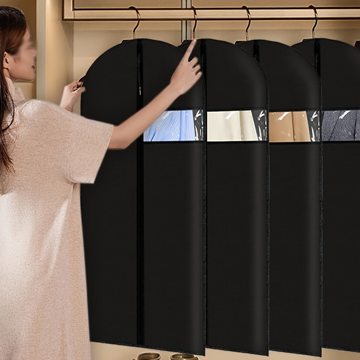 Five pieces of premium black garment bags featuring a pink zipper. These durable plastic covers are perfect for storing suits, dresses, and coats in your closet. This versatile hanging organizer is suitable for both men and women's clothing, making it a