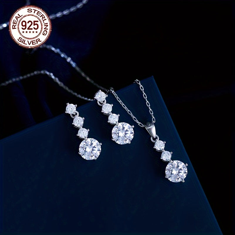 One set of elegant 925 sterling silver jewelry featuring classic 4-roundel drop earrings and pendant necklace with synthetic cubic zirconia. Perfect for daily wear or as a gift for Valentine's Day for women. Silver plated for added shine.