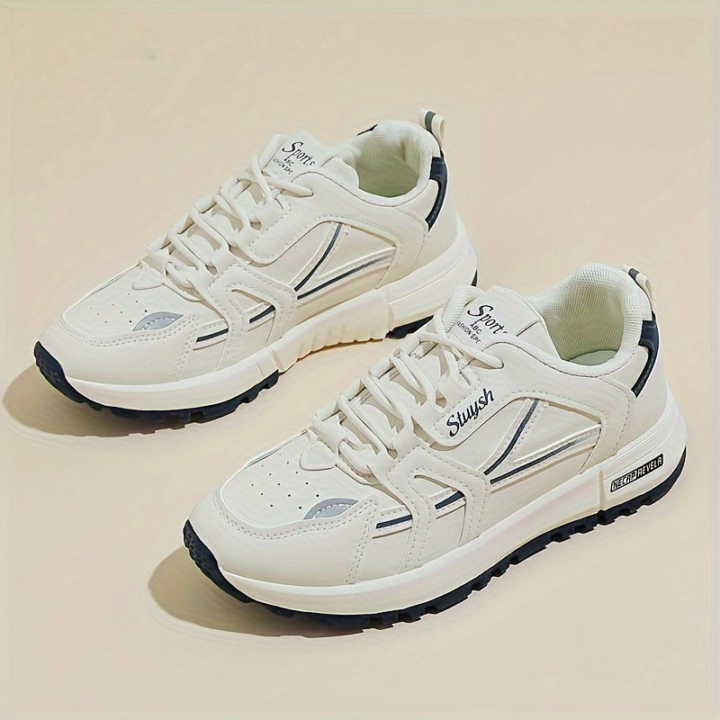 Casual women's running sneakers in white and brown, lace-up low-top design with textured faux leather upper and durable PU sole, comfortable all-season footwear.