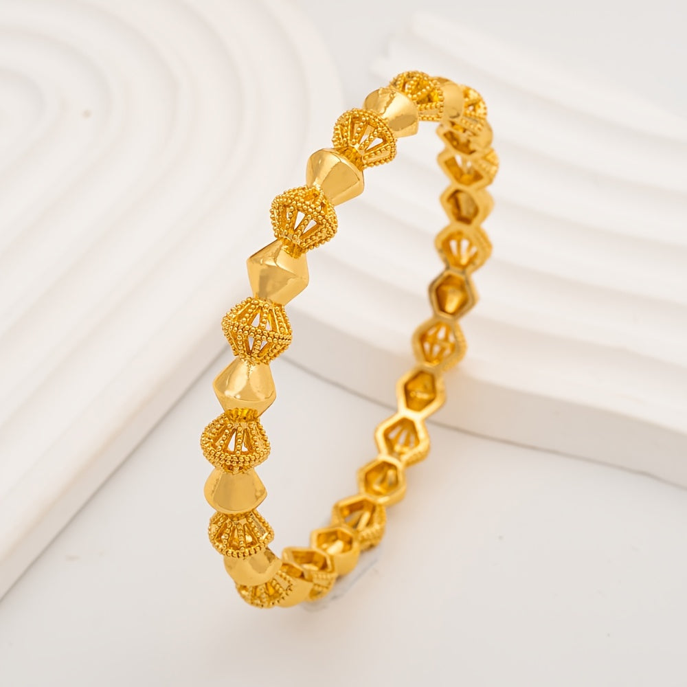 Two gold-tone alloy bangle bracelets that exude elegance and luxury fashion, inspired by Middle Eastern and African Nigerian styles. Perfect for weddings or daily wear, these versatile accessories are suitable for any season or occasion, including