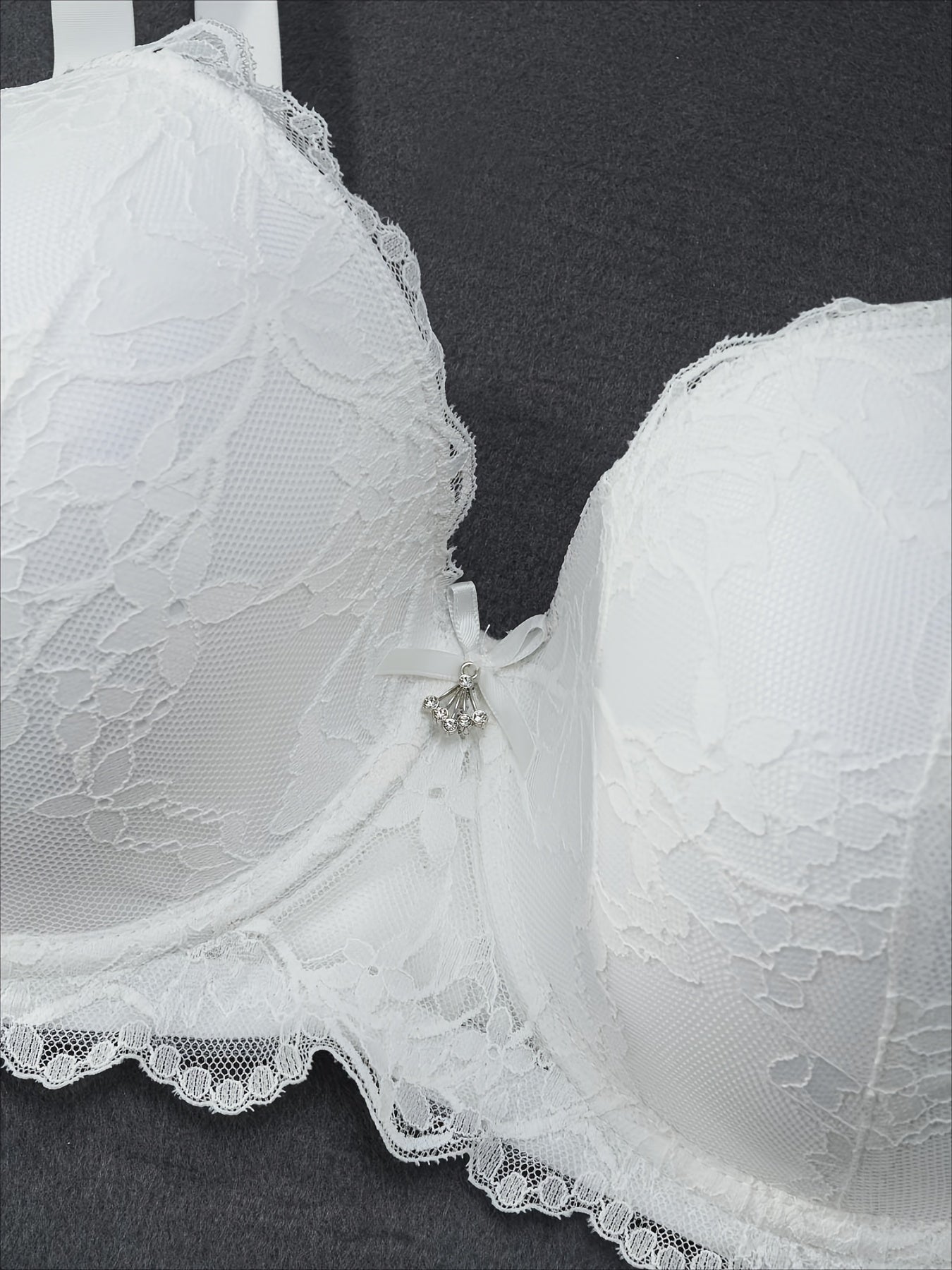 Elegant floral lace underwire bra for plus-size women with bow decor.