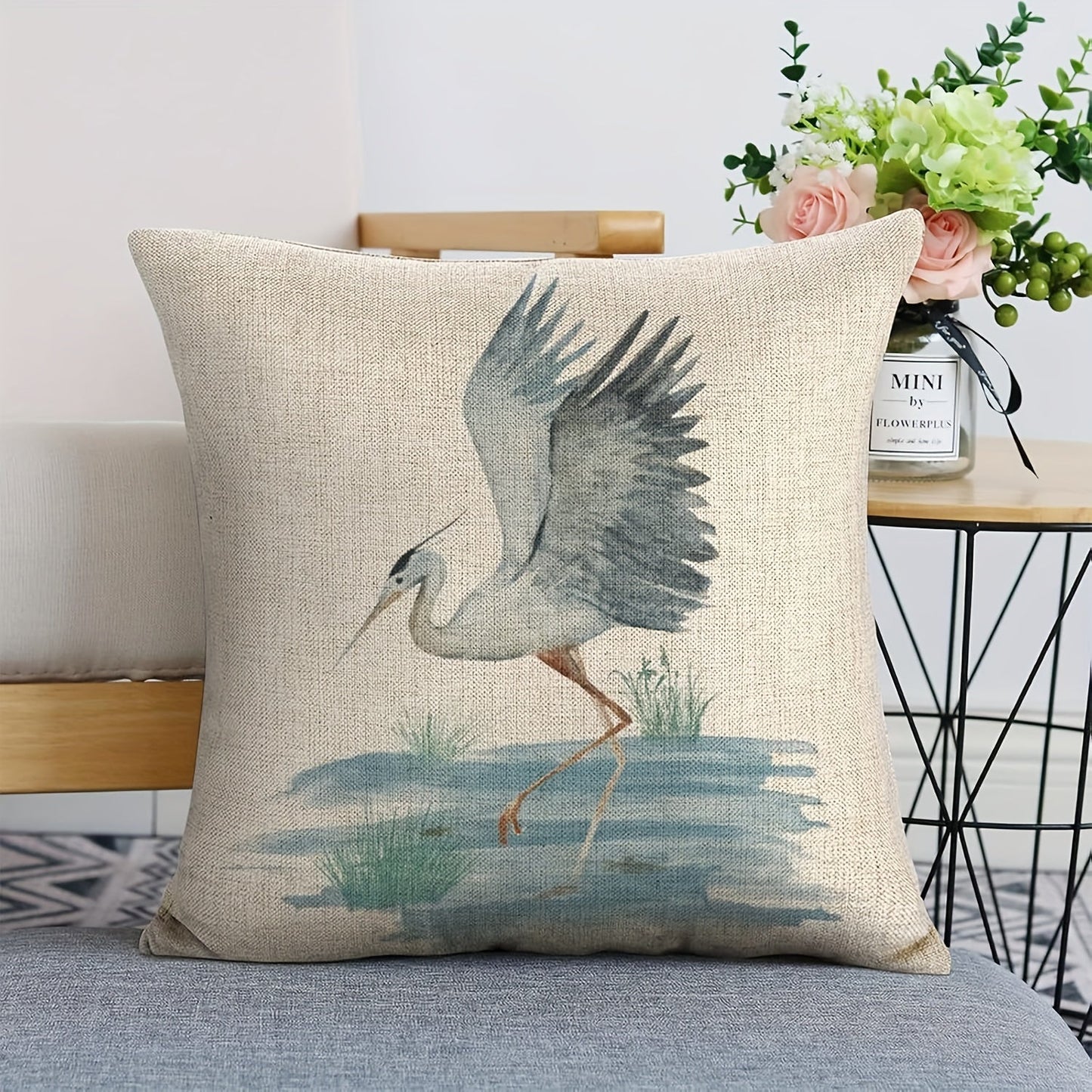 Elevate your decor with the 1pc Elegant Heron Bird Linen Pillowcase. This contemporary style pillowcase features a zipper closure for easy removal and machine washable convenience. The single-sided print showcases a stunning beige design with a blue/gray