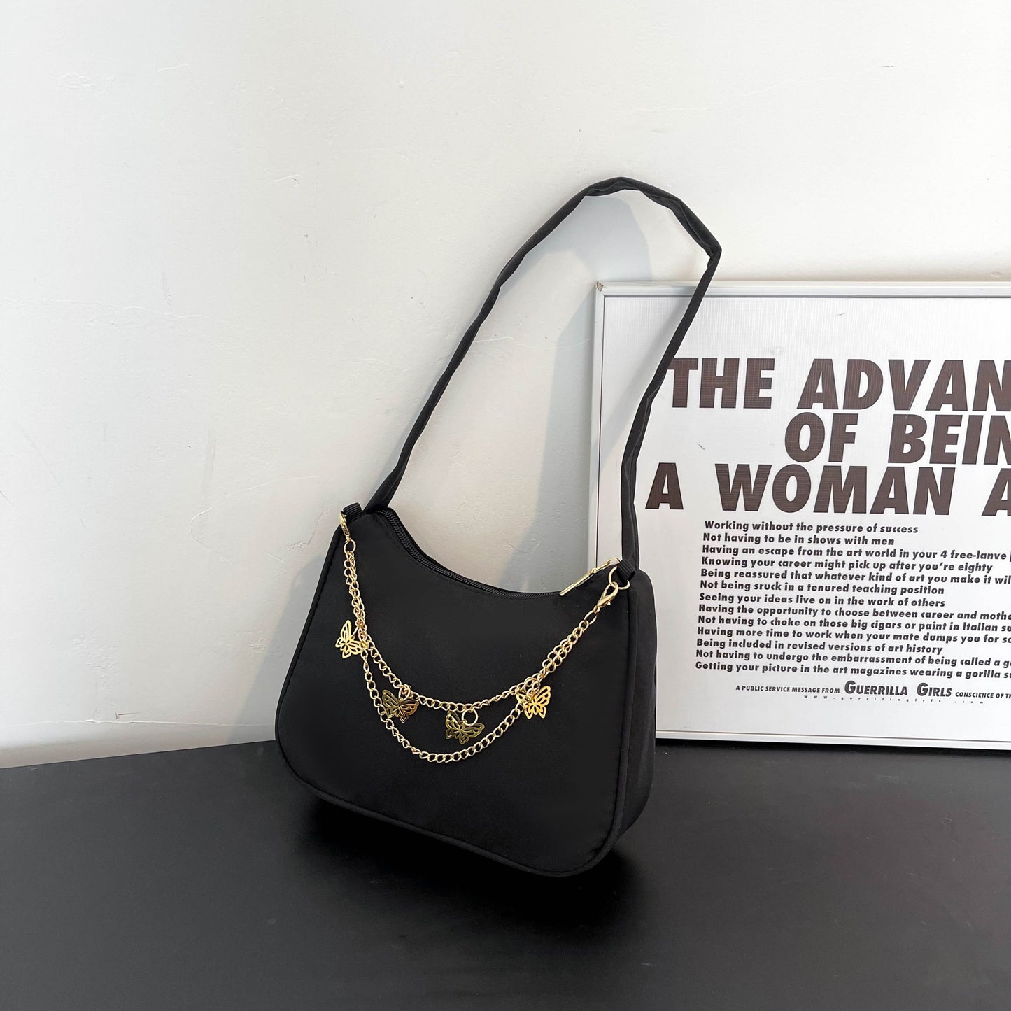 Stylish shoulder bag with butterfly chain, perfect for vacations, holidays, and parties.