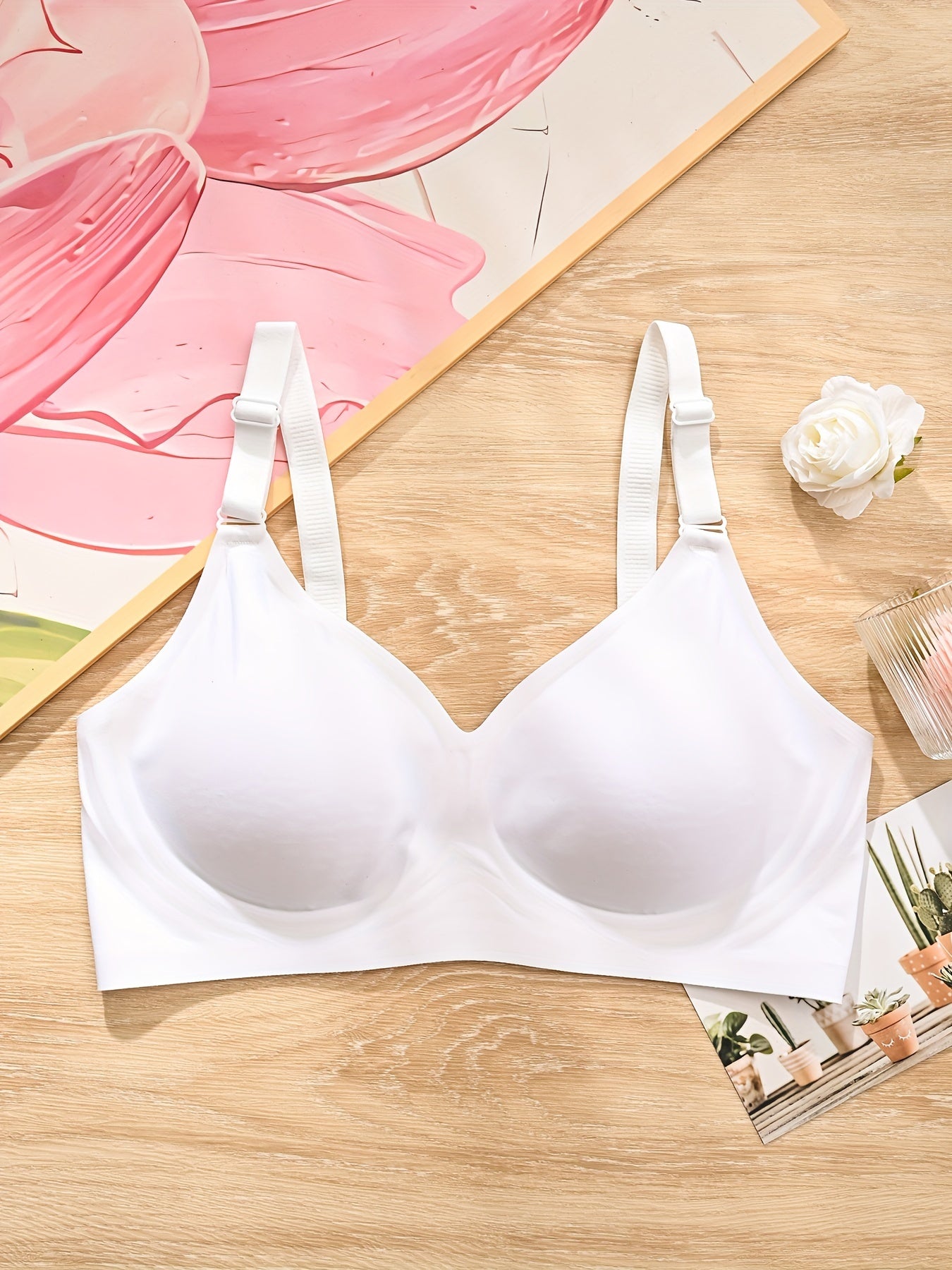 Elegant seamless jelly bralette for women: wireless and comfortable, with wide straps, built-in bra, and non-padded design. Made of nylon/elastane blend, ideal for casual attire.