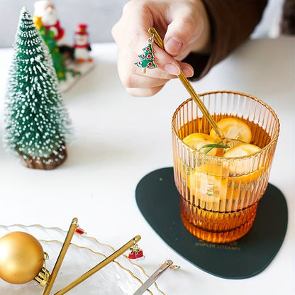 Set of four festive Christmas coffee and tea spoons crafted from stainless steel. These versatile spoons are perfect for stirring hot chocolate, enjoying ice cream, and indulging in desserts. They also make an ideal holiday gift and add a festive touch