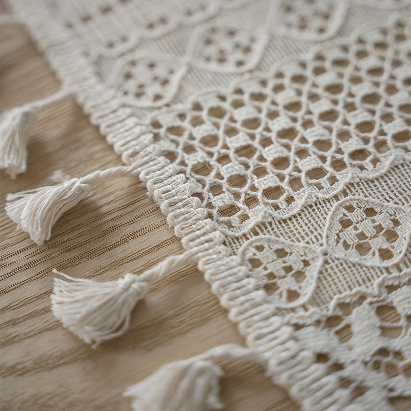 Bohemian chic crochet lace tablecloth, ideal for dining and parties. Rectangular polyester design with a farmhouse style, perfect for boho home decor. Great for buffet tables, banquets, and serving western food.