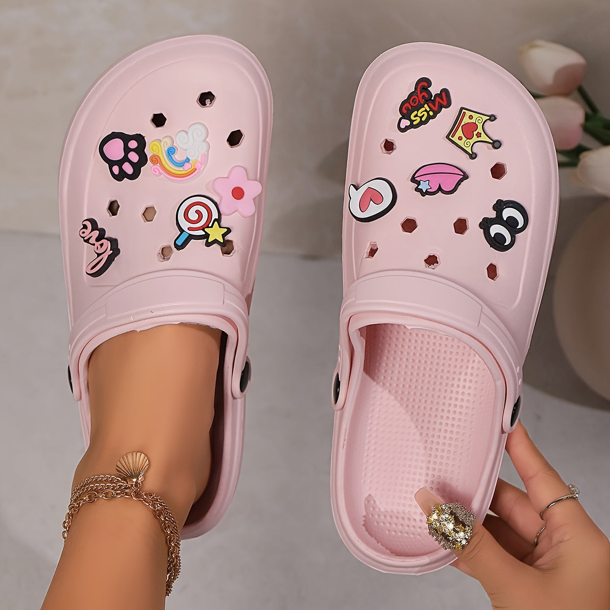 Elegant summer clogs for women - breathable beach sandals with thick soles and charm detail, versatile slip-on shoes for outdoor wear.