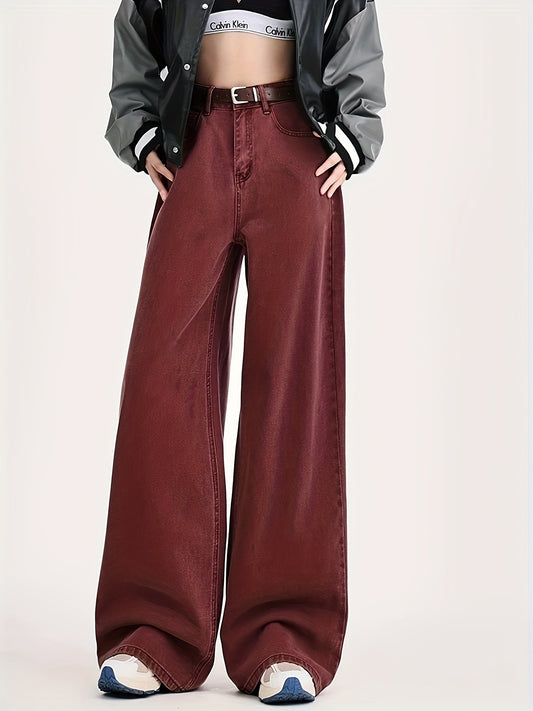 Red high-waisted wide leg jeans with slash pockets, vintage-inspired.