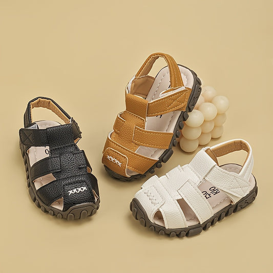 Boys trendy cut out sandals in assorted colors for casual outdoor walking.