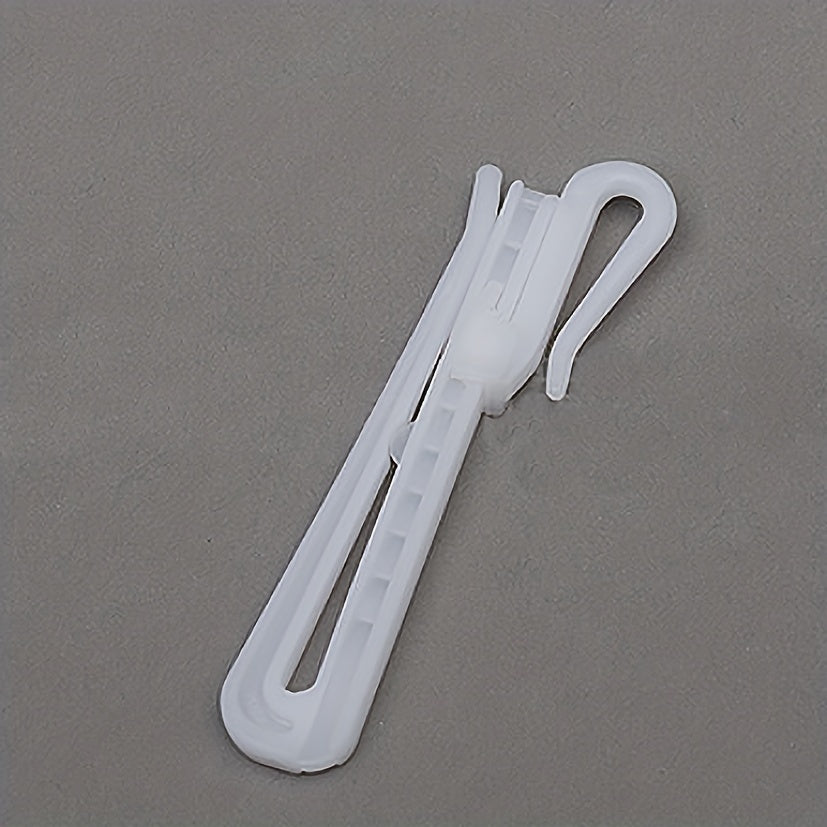 Retractable 3-inch plastic curtain hook with adjustable lift, designed for Korean pleated curtains.