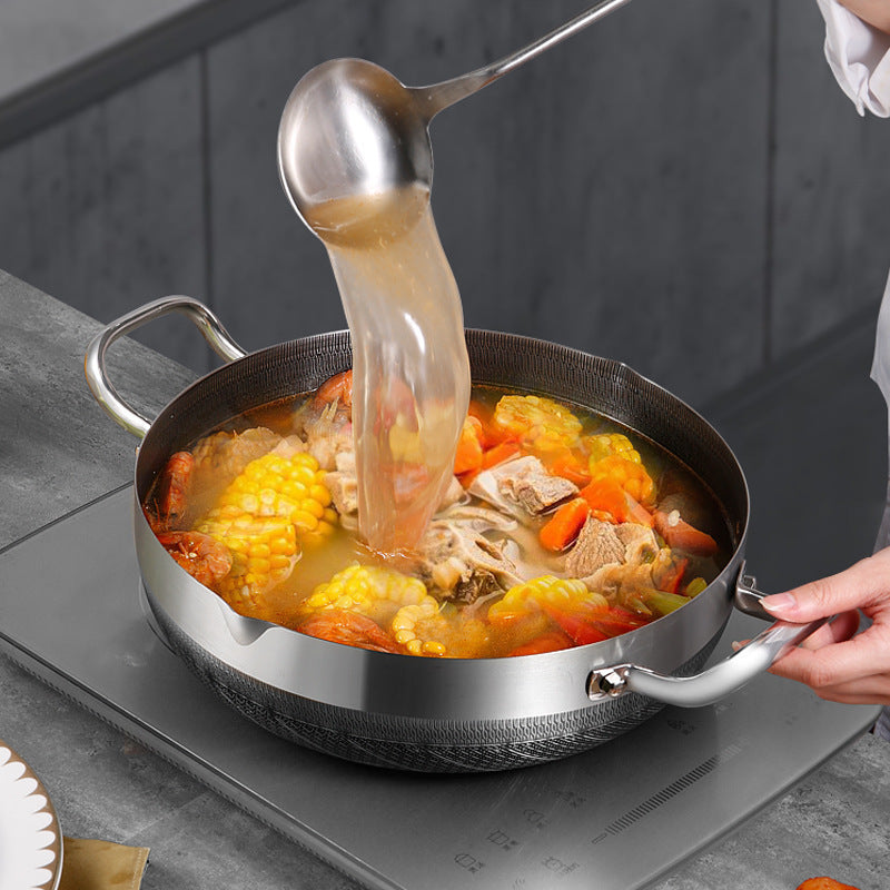 The 10-inch stainless steel frying pan comes with a lid and features a honeycomb non-stick bottom. It is induction compatible and has dual handles, making it versatile for use in various cooking methods such as hot pot and frying.