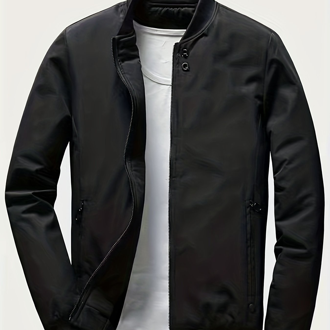 Casual long-sleeved jacket with zip, stand collar, pockets, and slim fit; ideal for spring and autumn.