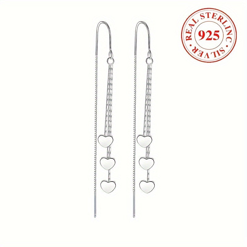 Elegant and simple, these glossy heart chain tassel dangle earrings are made of hypoallergenic sterling silver (925). The perfect delicate gift for a female, they will add a touch of elegance to any outfit.