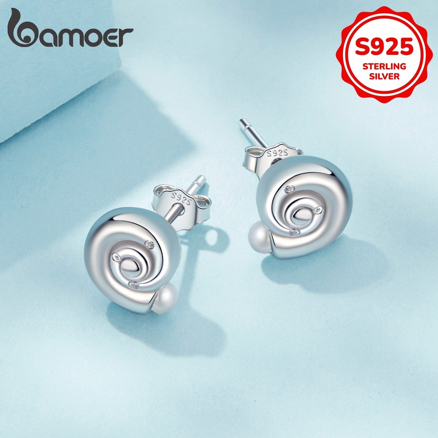 Add a touch of elegance to your look with these stunning seashell stud earrings for women. Crafted from hypoallergenic 925 silver with faux pearl inlay, these earrings are perfect for daily wear or as a thoughtful gift. Weighing 3.4g, these