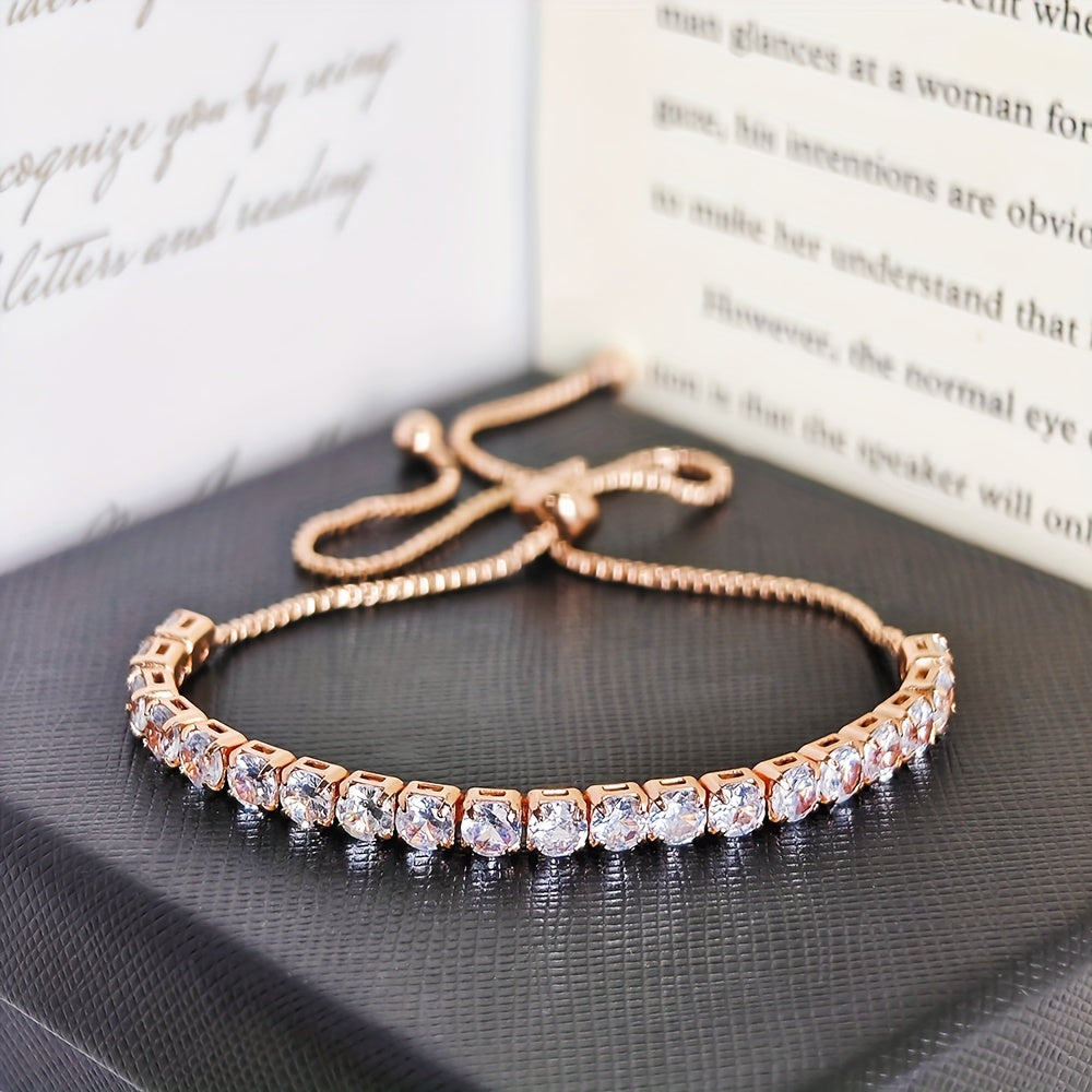 Stylish vintage-inspired cubic zirconia tennis bracelet with adjustable copper chain and sparkling rhinestones, ideal for parties or casual wear, great Valentine's Day gift.