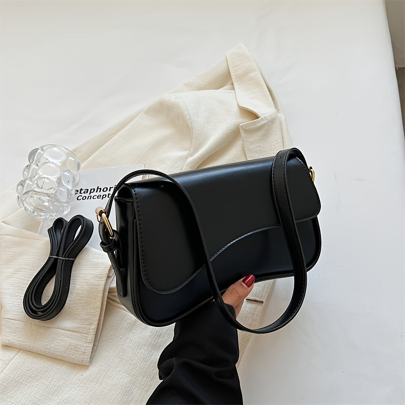 Stylish black crossbody bag with adjustable strap for casual and formal occasions.